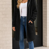 Manteau long femme à capuche en fausse peau lainée avec fermeture éclair