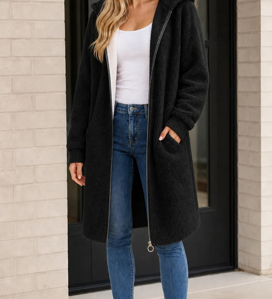 Manteau long femme à capuche en fausse peau lainée avec fermeture éclair