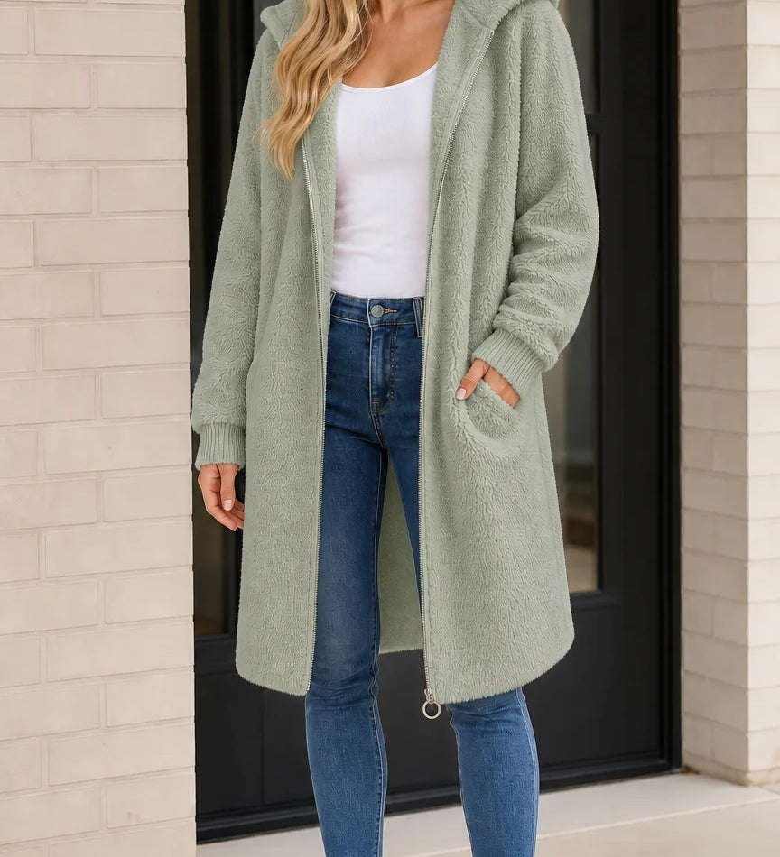 Manteau long femme à capuche en fausse peau lainée avec fermeture éclair