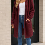 Manteau long femme à capuche en fausse peau lainée avec fermeture éclair