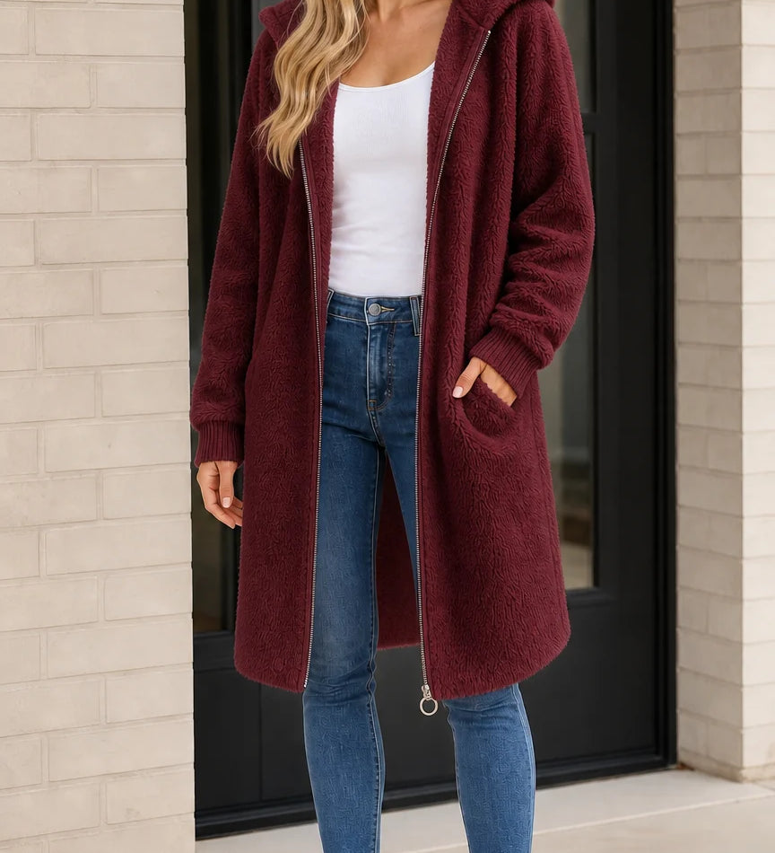 Manteau long femme à capuche en fausse peau lainée avec fermeture éclair
