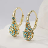 boucles d’oreilles fleurs turquoise plaquées or