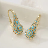 boucles d’oreilles fleurs turquoise plaquées or