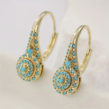 boucles d’oreilles fleurs turquoise plaquées or