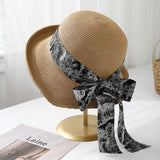 Doriana | Chapeau Brimmed à imprimé avec protection solaire